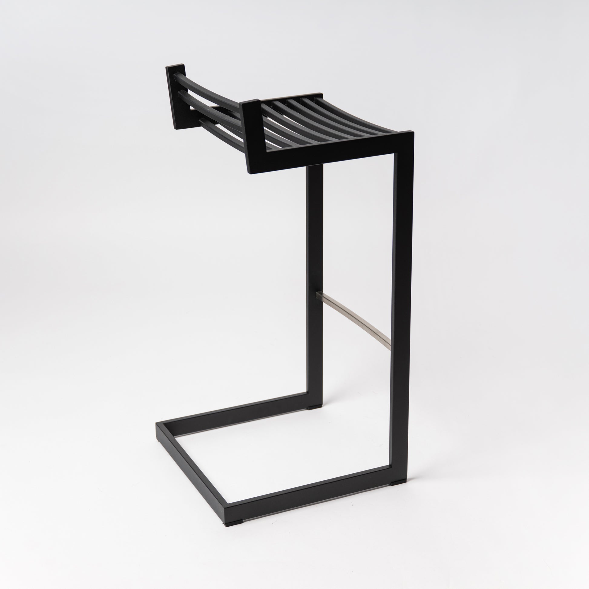 Rear view of Forma b Metalinea Black counter height stool showcasing the structural clarity and clean lines of the steel frame