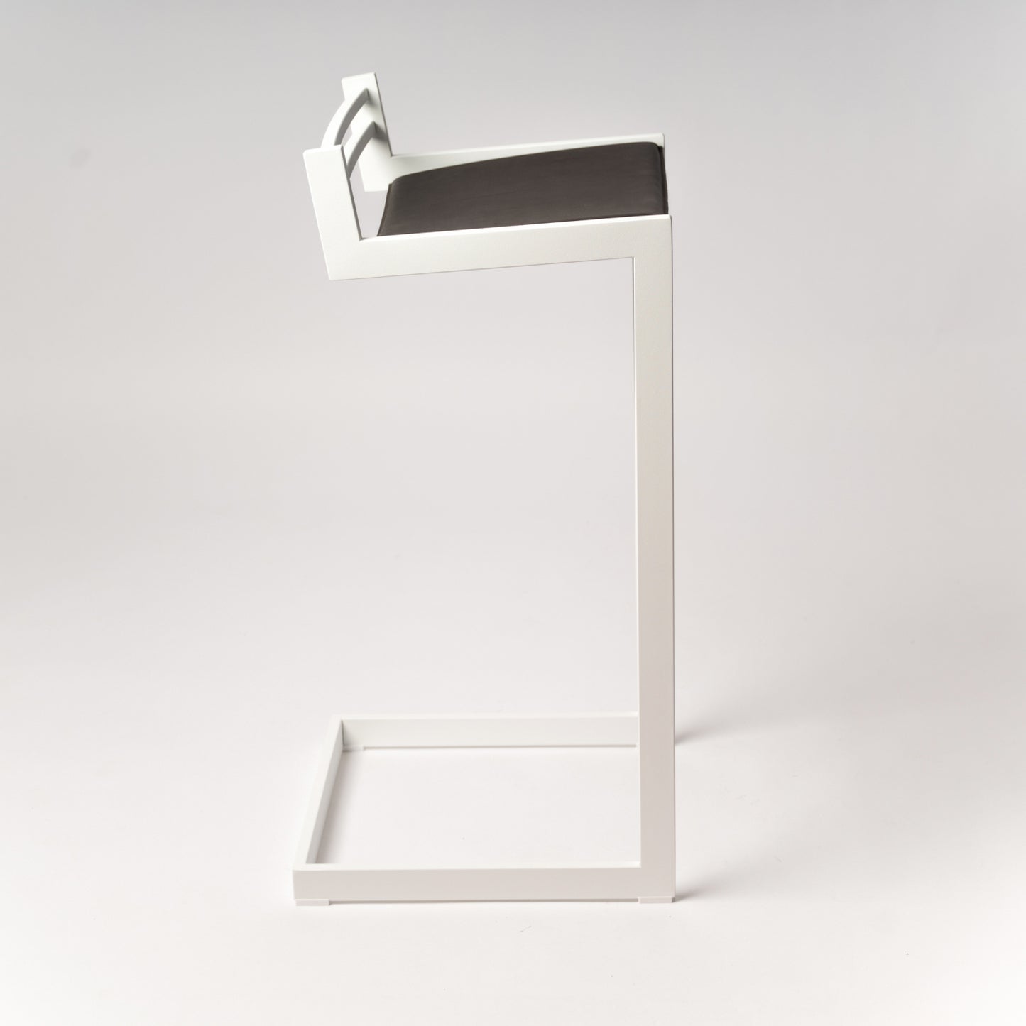 Forma b bar/counter stool with White stainless steel frame and Dark Brown Nappa leather - lifestyle image in modern interior setting
