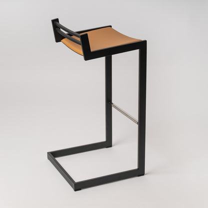 Minimalist Forma b stool - rear view of Camel Nappa leather craftsmanship and Black stainless steel construction, suitable for both bar and counter heights